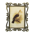 Factory Wholesale Vintage Hollowed-out Zinc Alloy Photo Frames for Family Hotel Decor