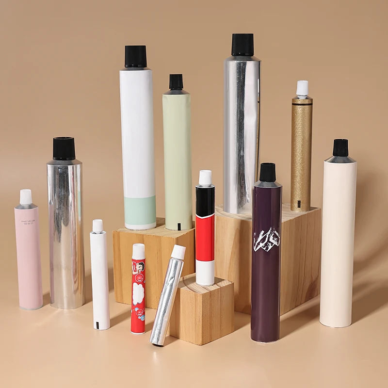 Customize Empty Round 60g Red Black White Color Essence Hand Cream Metal Tubes with Top Screw Lid with Glued Tail