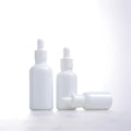 Hot Selling Glass Bottle Supplier 30ml 50ml 100ml Empty Refilled White Porcelain Essential Oil Dropper Bottle