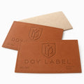 Design Custom Debossed Brand Logo PU Leather Clothing Labels for Jeans