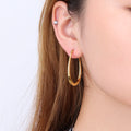 Chris April 316L Stainless Steel PVD Plated Gold Oval Hoops Earring