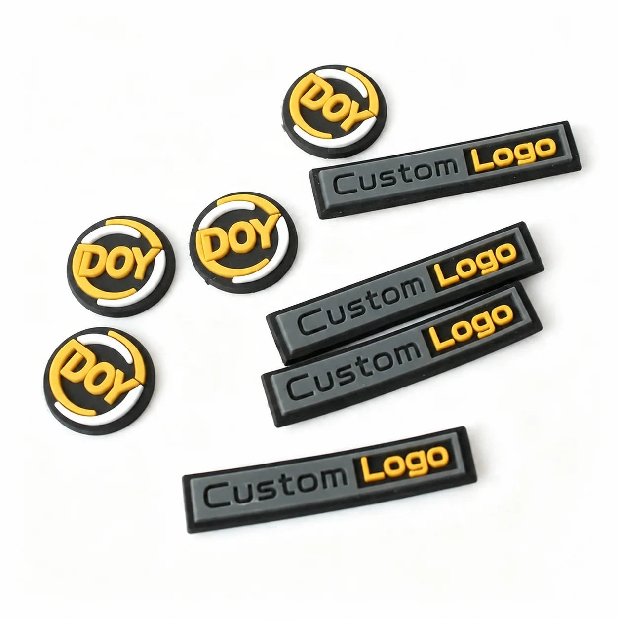Custom 3D Embossed Brand Name Logo Soft Injection Silicon Rubber Stickers With Self-adhesive Backing