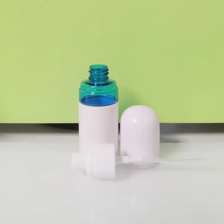 New Design 50ml 70ml 100ml Capsule Shape Plastic Spray Bottle White Spray PET Capsule Bottle Manufacturers Wholesale