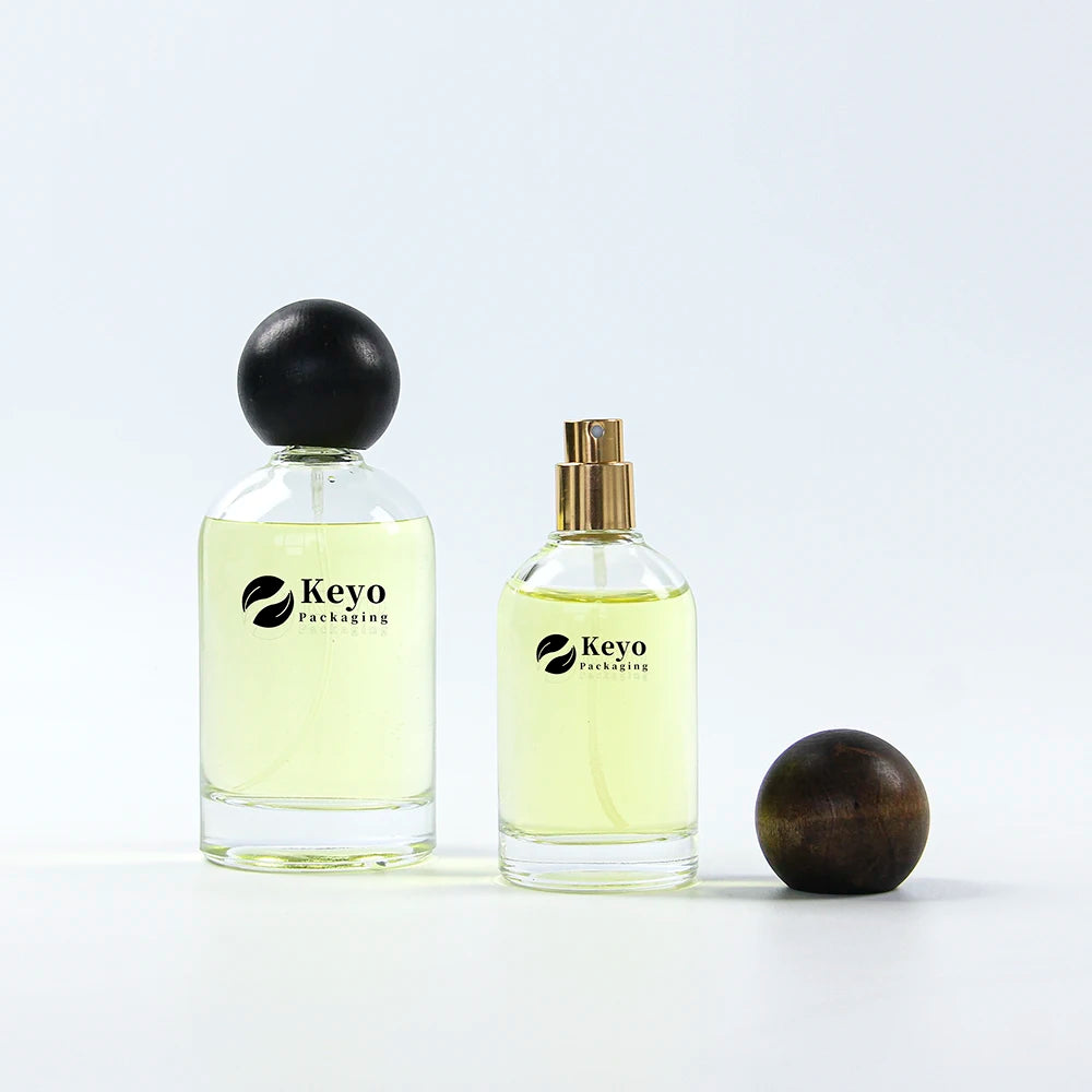 OEM Factory Price Wholesale Empty Cylinder Perfume Bottles 50ml 100ml Glass Wood Lid Eco-friendly Durable Hot Stamping