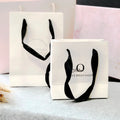 Hot Selling Luxury Matt White Kraft Paper Gift Bags Custom Logo Printing Low MOQ for Clothing and Shoes Packaging