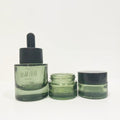 Customized Thick Bottom Glass Cosmetic Packing Set 50g 40ml 100ml 120ml 150ml Glass Lotion Bottle with Frosted Lid