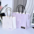 2023 New Simple Spot Gift Paper Bag Leaf Pattern Purple Light Luxury Handbag Rivet Packaging Bag Customized Bags