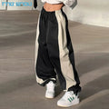 Custom Outdoor Streetwear Casual  Windbreak Elastic Waist Baggy Pants Color Block Wide Leg Pants Nylon Track Parachute Pants Men