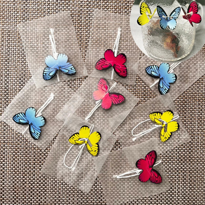 Custom Empty Tea Filter Roll Pyramid Bag Nonwoven Mesh Woven Biodegradable PLA Corn Fiber Tea Bag With Butterfly Tag