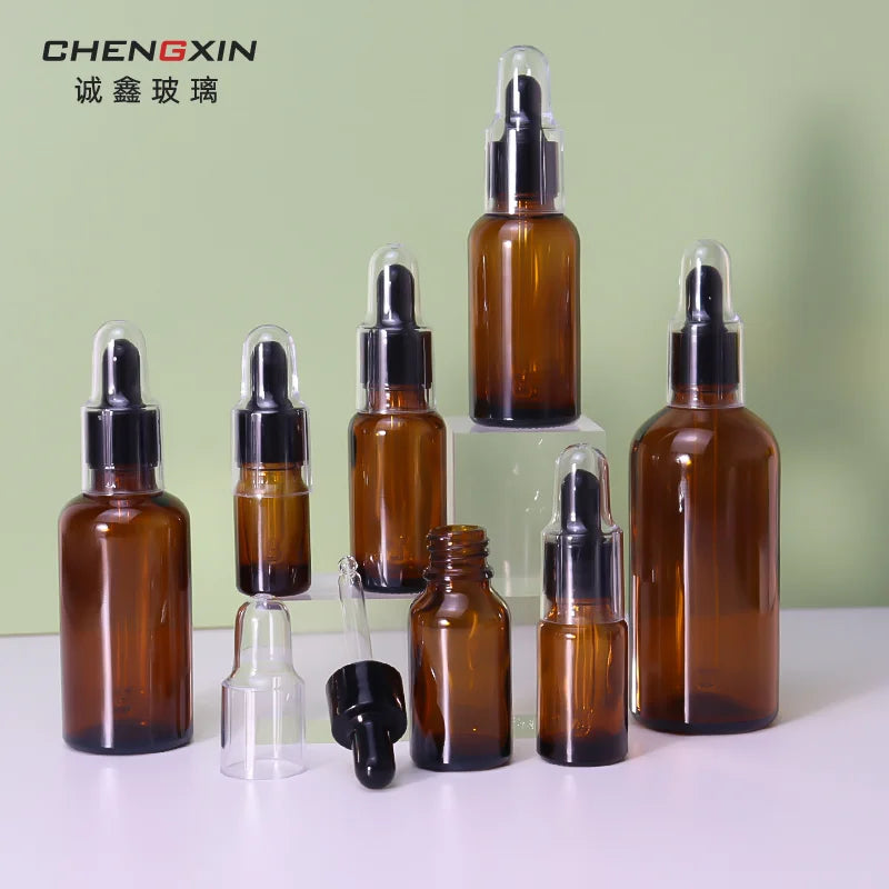 Luxury 30ml Brown Glass Screen Printed Essential Oil Bottle Light-Proof Screw Cap Tea Dropper Dust Cover Skin Care Serums Stock