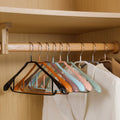 Wholesale Curved Metallic Luxury Hangers Non Slip Metal Dipped Plastic Clothes Hangers in Clothing Stores
