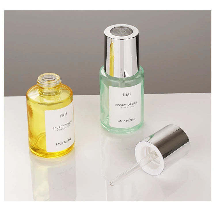 30ml Essence Bottle Cosmetic Bottle Bottling  Rotary Switch Button Typeglass Dropper Bottle in Stock