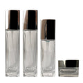 Costom Color Clear Empty SkinCare Bottles Glass with Silver Cap Lotion Cream Containers