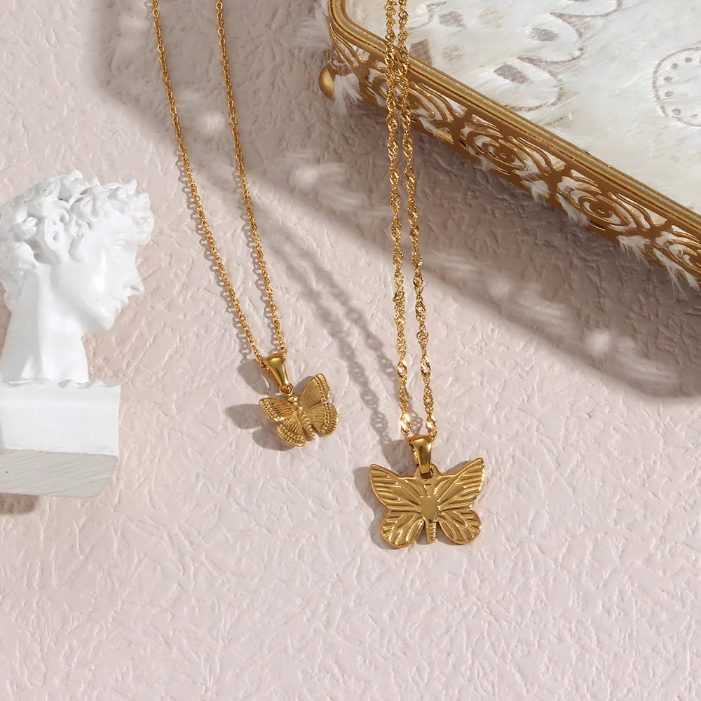 Wholesale Price Vacuum Gold Plating Stainless Steel Water Wave Chain Butterfly Charm Necklace for Women