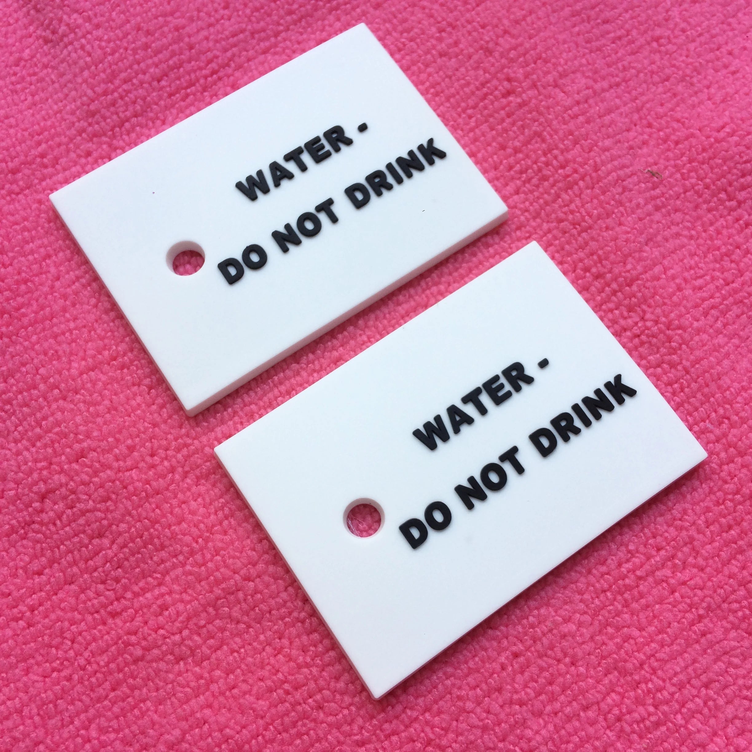 Promotional Custom Raised logo 3D Rubber Tag With Holes3mm Thickness Rubber Plastic Label for Apparel