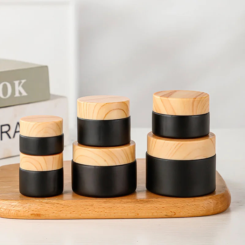 Custom logo Frosted Black Glass Refillable Empty Cosmetic Jar Pot Eye Shadow Face Cream Container With Wood Grain Cap
