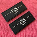 Customized Soft 3D Trademark logo PVC Rubber Patchsew on Embossed Private Brand Silicone Rubber Tag for Clothing