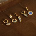 New fashion retro ethnic style titanium steel gold-plated creative geometric glaze earrings personality jewelry female