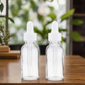 Customizable Cylinder Glass Dropper Bottle for Skincare 15ml 30ml 50ml 100ml Capacities Flat Empty Serum Packaging Free Screw