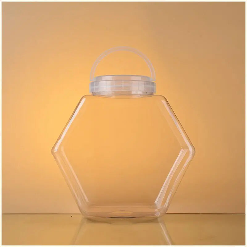 Customized Logo Factory 30 Ounces 850ml 1500ml Plastic Hexagonal Pet Fishbowl Candy Jar with White Cap for Chocolate Chewing Gum