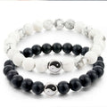 Hot Selling Classic Animal Shape White Pine Matte Magnet Love Couple Baguatu Stainless Steel Beaded Bracelet Set for Anniversary