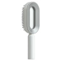 Factory Wholesale Scalp Massage Hairbrush Plastic Massage Comb Self Cleaning Hair Brush for Women.