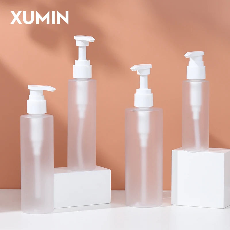 Wholesale Frosted Plastic Flat-Shoulder Cosmetic Pump Bottle for Shampoo and Conditioner Body Wash Oil Lotion 100ml 300ml 500ml