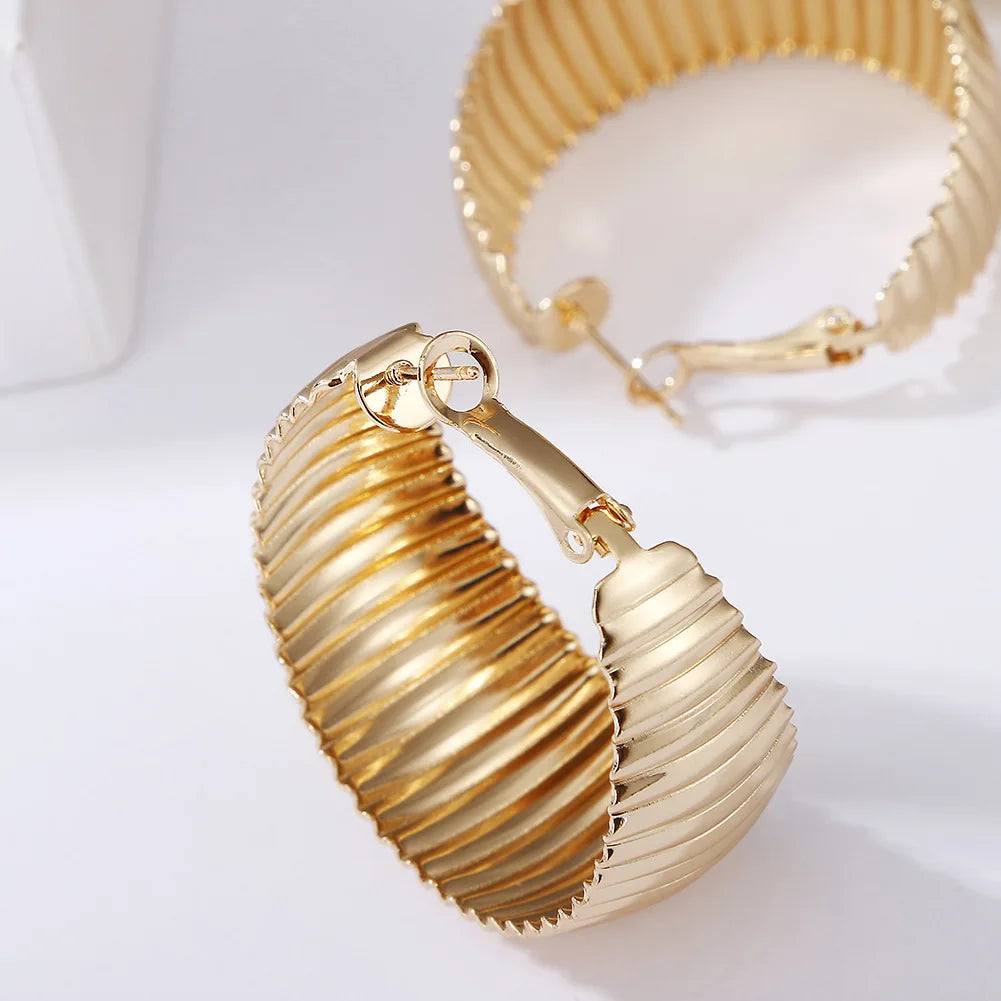 Fashion personality gold geometric twist exaggerated hip hop hoop earrings