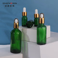 In-Stock 50ml 30ml 10ml Green Glass Essential Oil Bottles Screw Cap for Essential Oils Essence for Skin Care Cream Box Packed