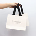 Custom Brand Name Flexiloop Handle Paper Grocery Bag White Coated Printing Paper Packaging Bag for Gift