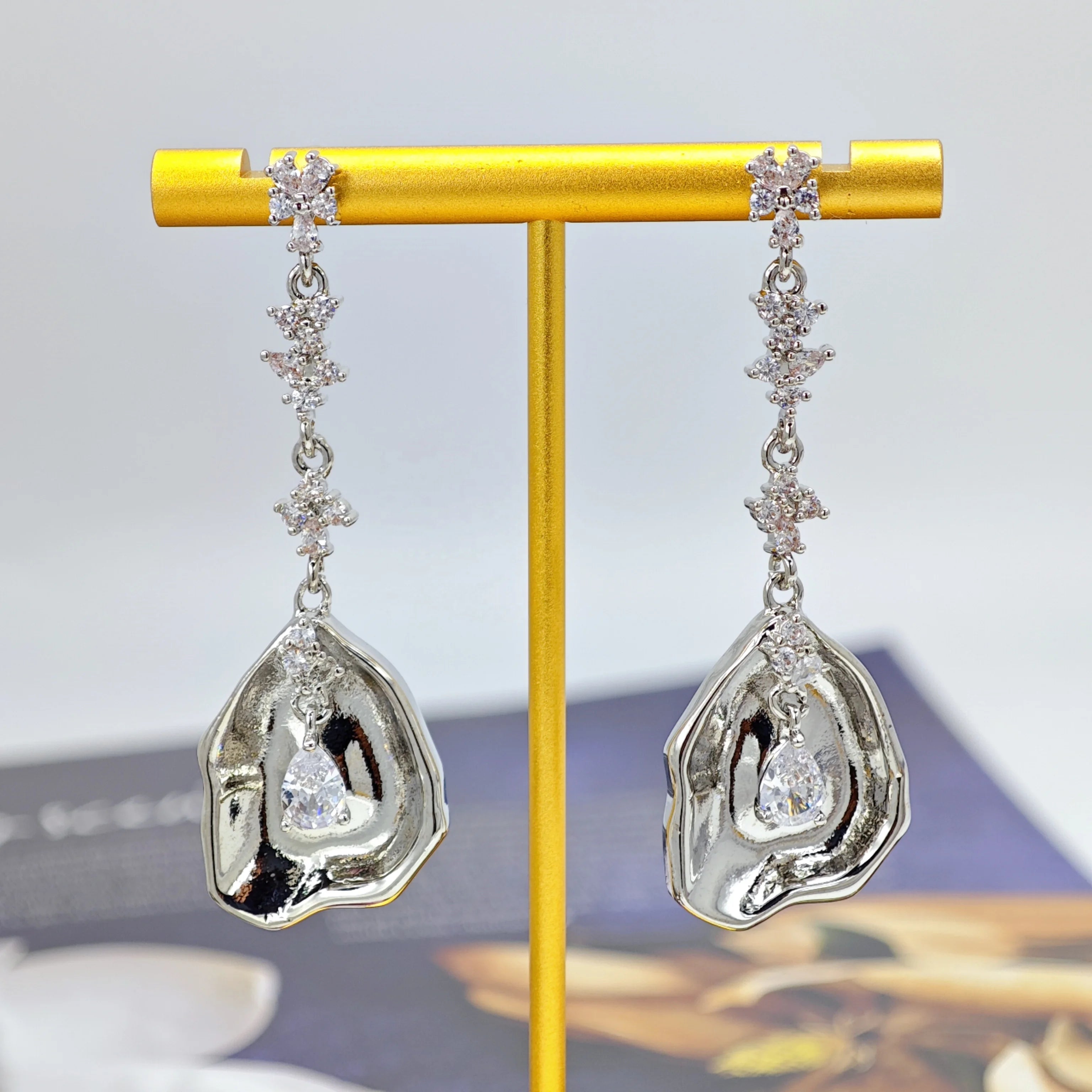 Ilona Wholesale Bulk Silver Plated Copper Abstract Oyster Shell Drop Earrings CZ Teardrop Charm Modern Dangle Jewelry for Women