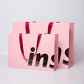 Hot Sale Custom Pink Paper Bag with Handle Luxury Gift Shopping Packaging Bag for Clothing with Logo Paperbag