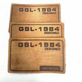 Manufacturer of Custom Eco-Friendly Vintage Leather Applique for Hats Garments Bags & Shoes-Embossed Labels Custom Size Shape