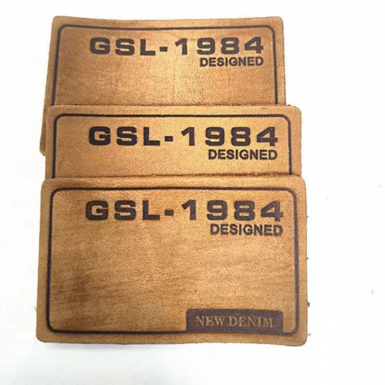 Manufacturer of Custom Eco-Friendly Vintage Leather Applique for Hats Garments Bags & Shoes-Embossed Labels Custom Size Shape