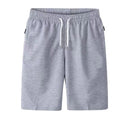 Summer High Quality Polyester Comfortable Breathable Solid Color Casual Gym Beach Style Drawstring Mesh Sweat Shorts for Men MegaBDM