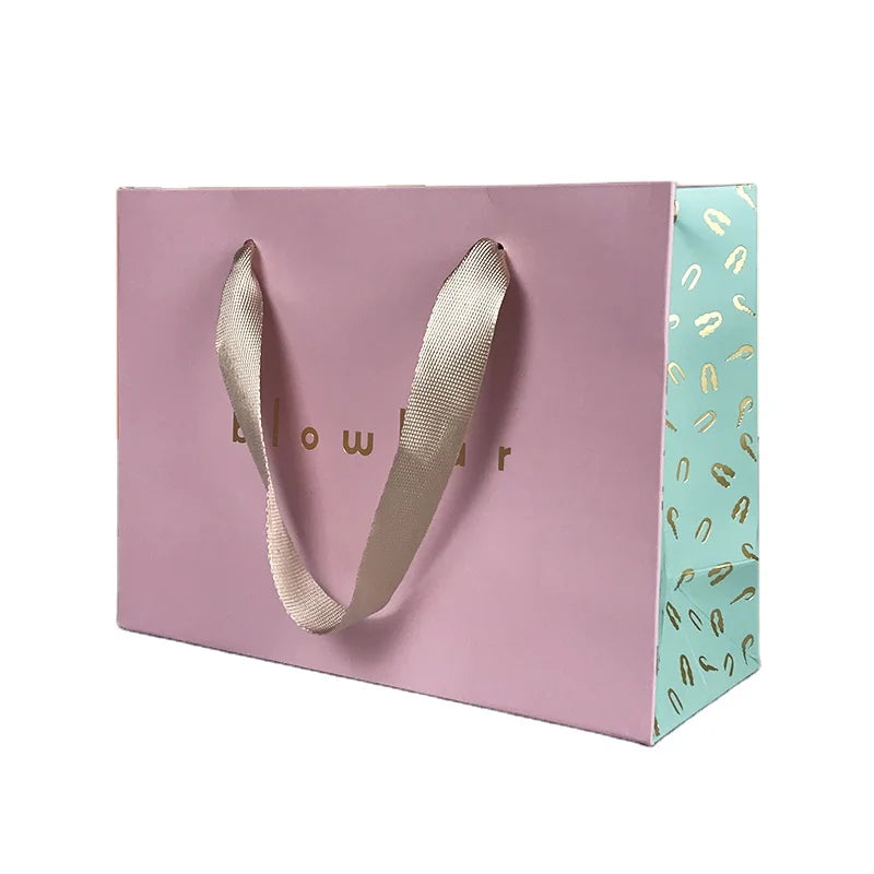 For Wholesale Luxury Gift Shopping Ivory Board Cosmetic Packaging Bag with Gold Logo Hot Stamping Skin Care & Blush