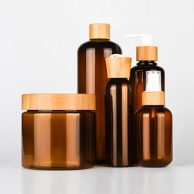 Cosmetic Package Set 250ml Cream Jar 60ml 120ml 250ml 500ml Amber Frosted Plastic Bottle with Spray Lotion Pump Bamboo Lid