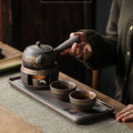 Hot Sale Japanese style Retro Simple Kung Fu Tea Cup And Saucer Set Stoneware Teapot Stove Heating Ceramic Tea Set With Stand MegaBDM