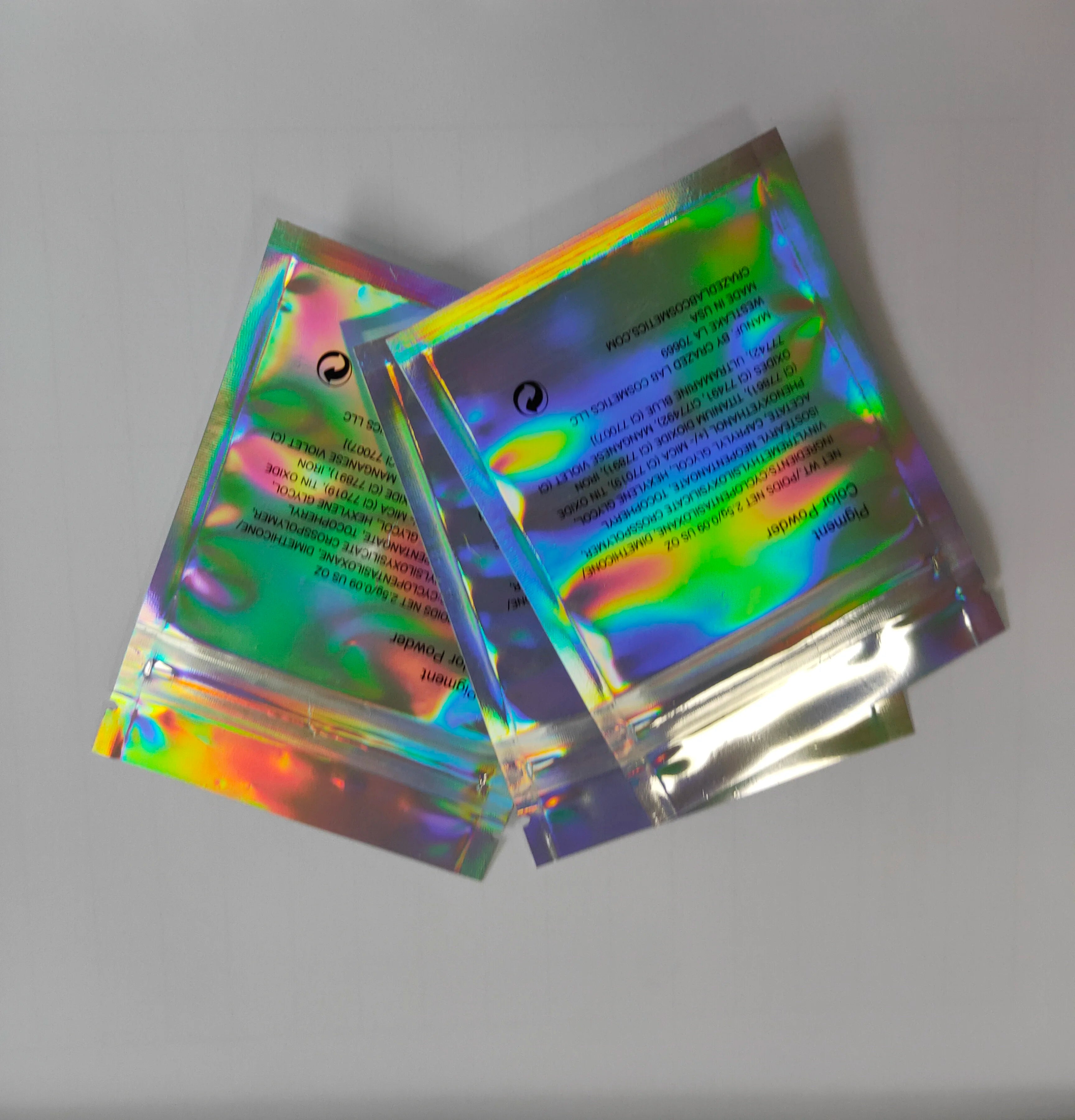 Custom Clear Front Zip Lock Aluminum Foil Holographic Laser Film Bags Resealable Holographic Foil Pouch Mylar Ziplock Bags