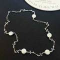 55cm International Style Cro Heart Button Sweater Chain AAAA Grade Platinum Plated Luxury Baroque Freshwater Pearl Necklace 12mm