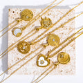 Retro Stainless Steel Zircon Sun Disc Pendant Necklace Gold Plated White Mother of Pearl Heart Choker Necklace for Girls Gift