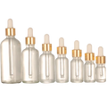 Luxury 50ml Flat Glass Dropper Bottle with Gold Cap for Essential Oils Clear Eye Oil Serum Luxury Hair Oil Packed in Carton