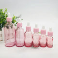 Wholesale Customized 10ml 15ml 30ml 50ml 100ml Luxury Hair Oil Pink Glass Dropper Bottle Rose Gold Luxury Essential Oil Bottles