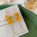 Hot Sale Summer Personality Simple Temperament Tassel Earrings Bohemian Flower Pendant