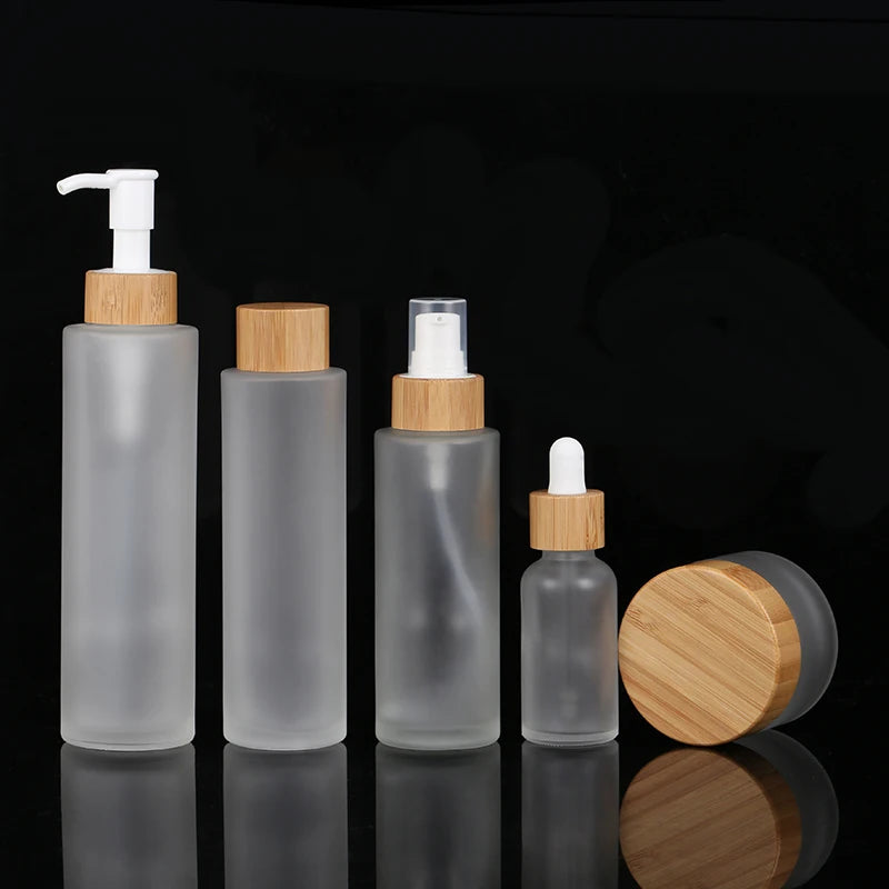 Eco Friendly 120ml Cylindrical Flat Shoulder Liquid Foundation Bottle Frosted Glass Spray Empty Lotion Bottle With Bamboo Pump