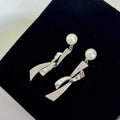 Allergy Resistant Platinum Plated AAAA Drop Earrings with Blade Bow Design 6-7mm Pearl Jewelry for Women