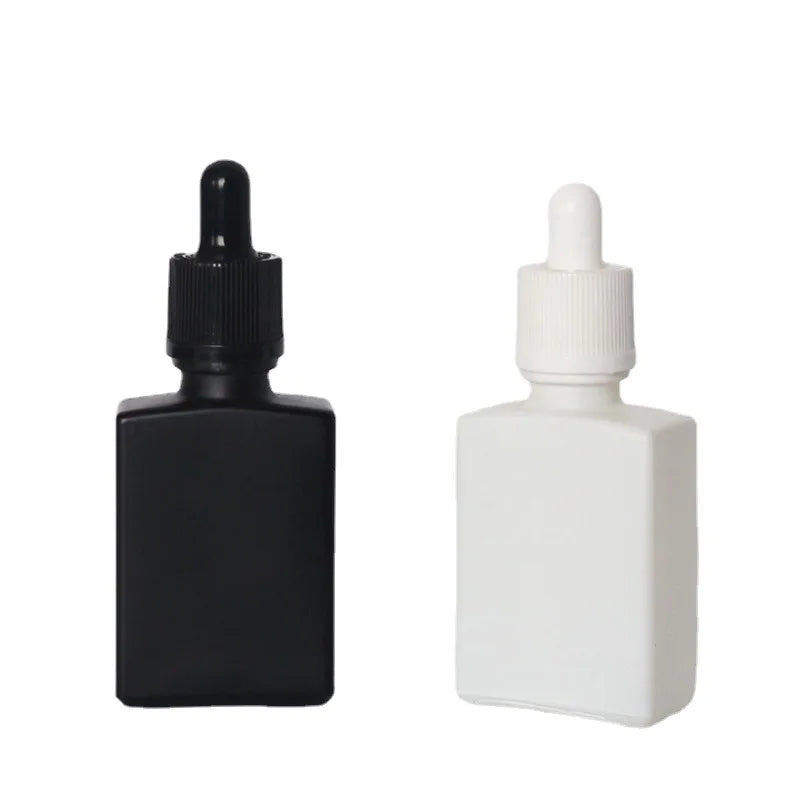 Customized 30ml 50ml 100ml Transparent Frosted Flat square Glass Bottle Matte White Black Essential Oil Dropper Bottle for Sale