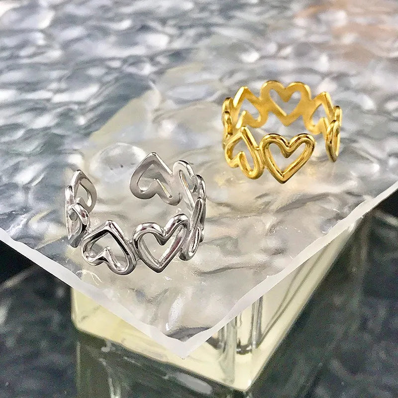 Wholesale Factory Price Cheap Gold/Silver/Rainbow Hollow Heart Stainless Steel Ring for Men Women