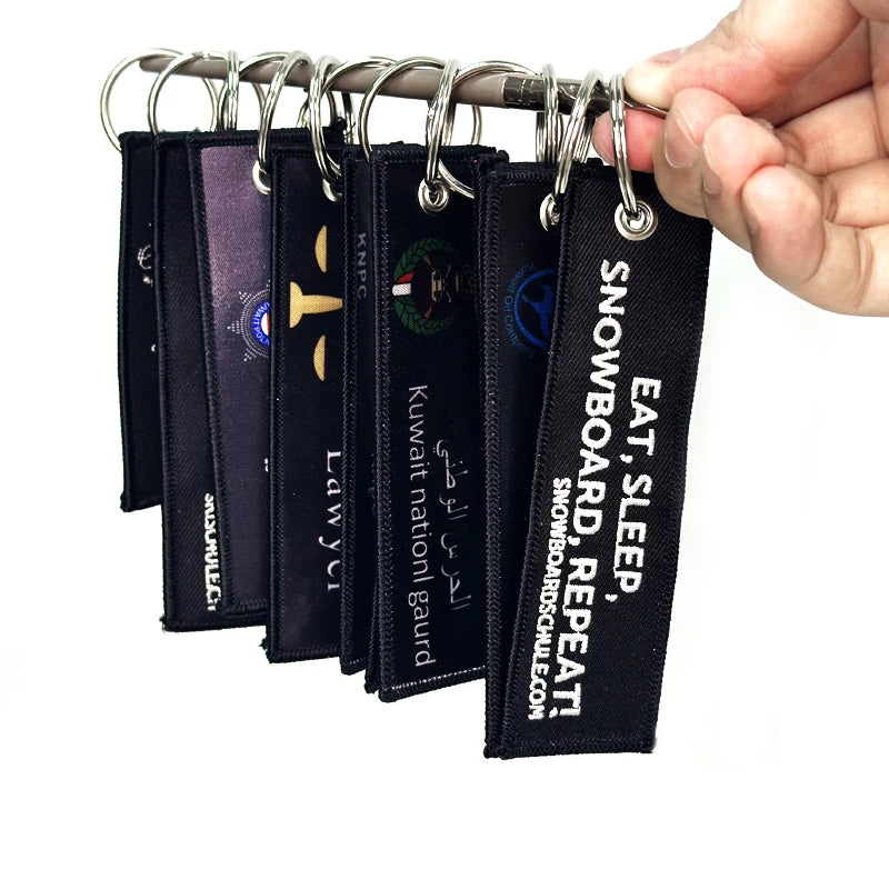 Wholesale Custom Cartoon Rubber PVC Embroidery Keychains & Keyrings with Logo Fabric Design