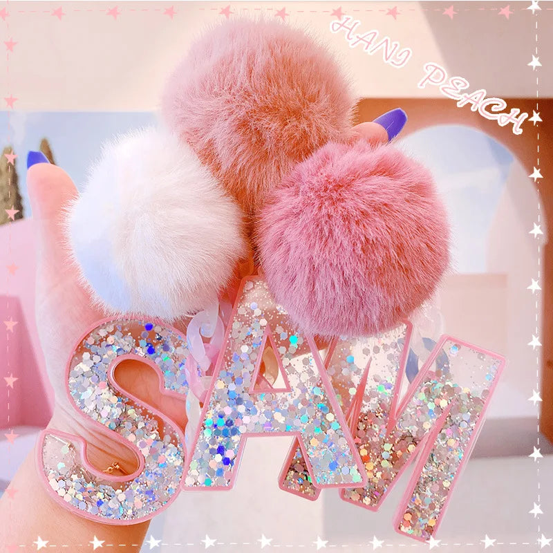 New Arrival Candy Rainbow Color Puffer Ball Charms English Letter Keychain Sequin Pompom Puffer Ball Glitter Keychain Resin